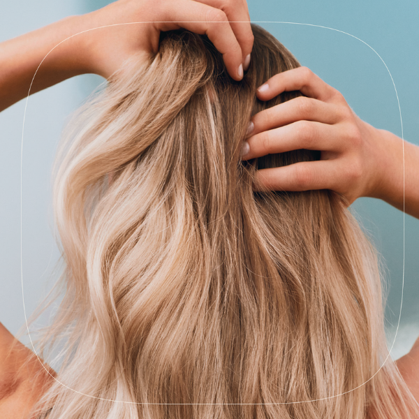goldwell-dualsenses-blondes-highlights-anti-gelbstich-conditioner-blondes-haar-mit-gepflegter-haarstruktur