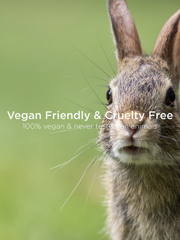 asp-kitoko-haarpflege-nahaufnahme-eines-kaninchens-auf-gruenem-hintergrund-mit-text-vegan-friendly-und-cruelty-free