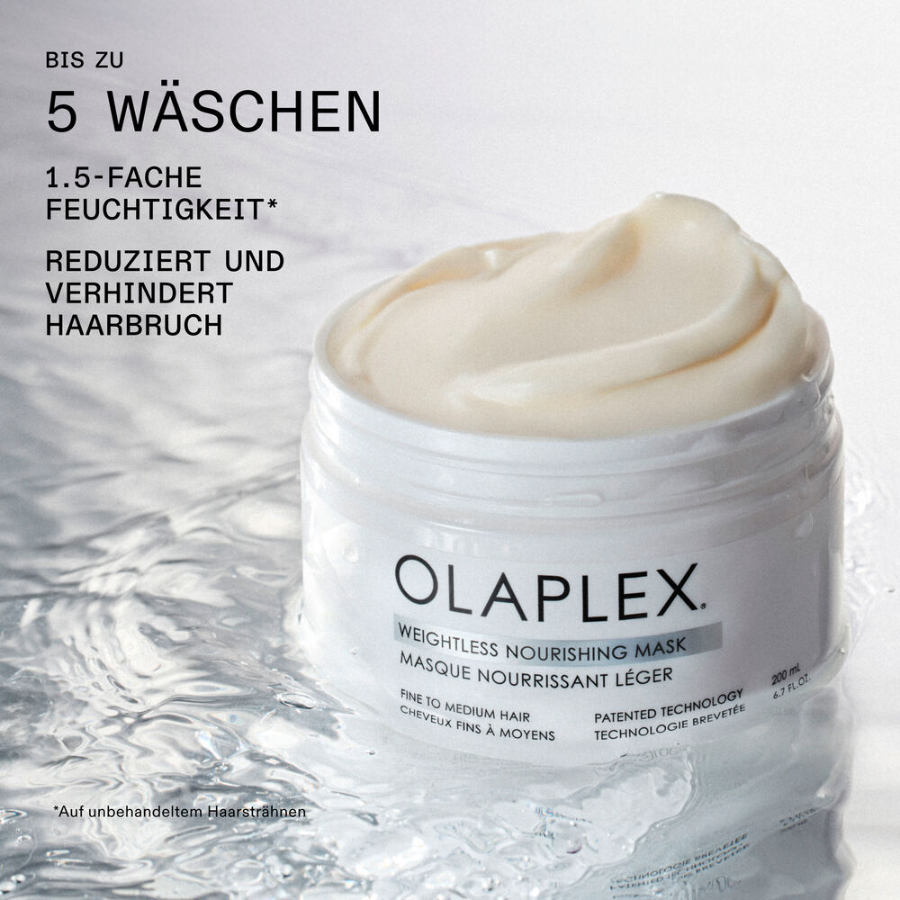 olaplex-haarmaske-fuer-feines-bis-mittleres-haar-mit-leichter-cremetextur-in-offenem-tiegel-auf-eis-untergrund